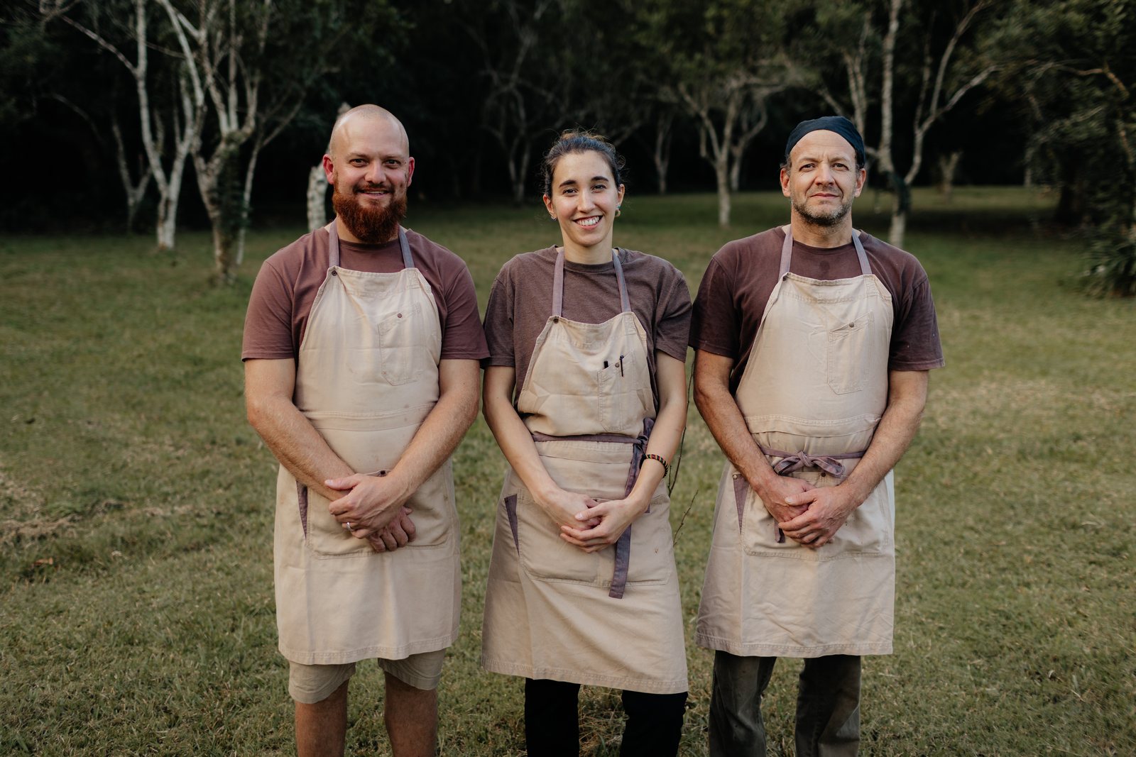 The Good 2 Eat Catering team in their aprons